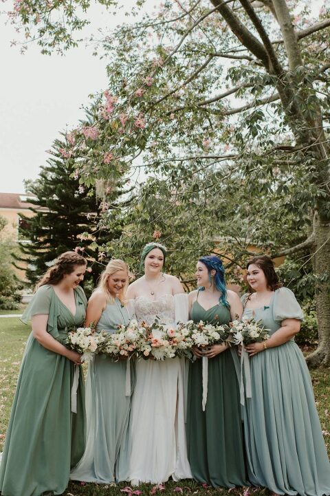 mismatched bridesmaid dresses in sage green at The Capen House